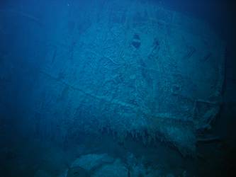 Large piece of twisted steel plate on seabed